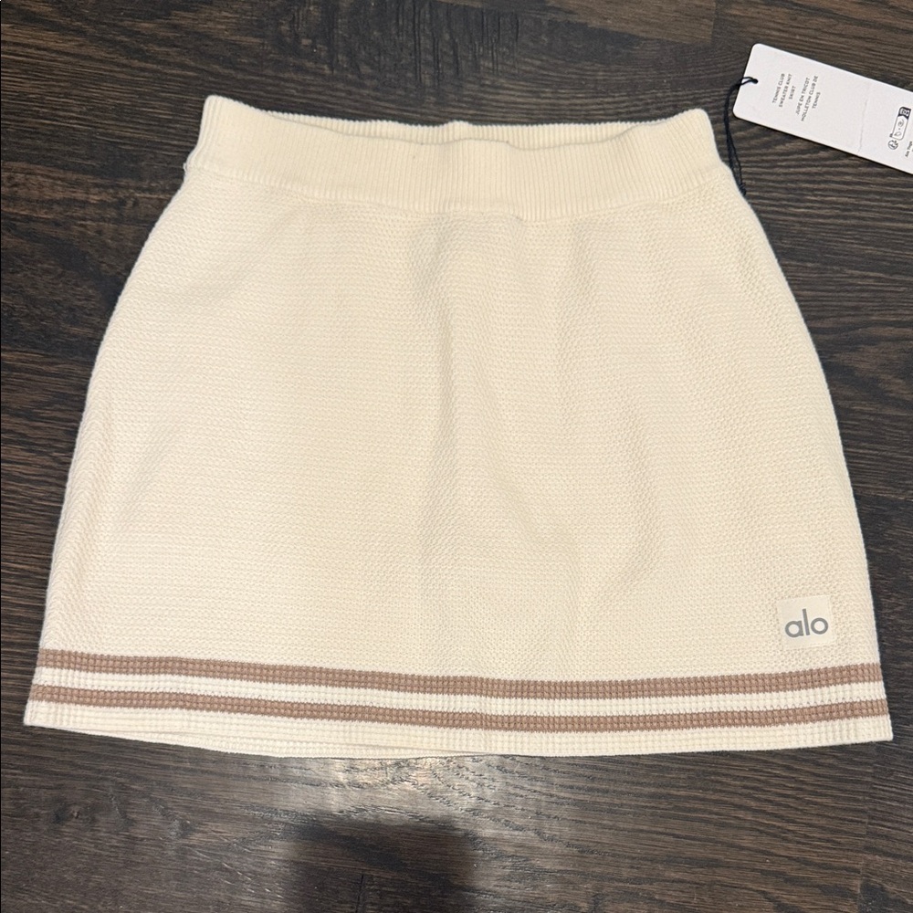 ALO Yoga Cream and Brown Mini Skirt